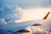 Migrating to newer technologies, like sustainable aviation fuels (SAF), battery electric or green hydrogen has the potential to reduce CO2 emissions from aviation. Photo by Ross Parmly/Unsplash.