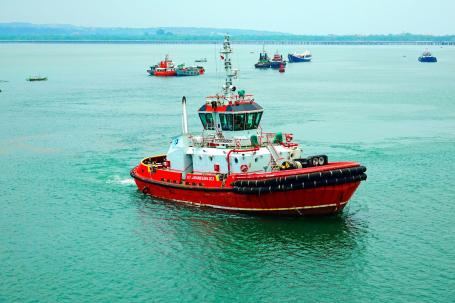 Tugboat. Photo by Dennis MacDonald/Shutterstock.